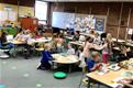 A classroom with updated furniture (with the exception of updated chairs).